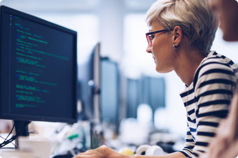 Woman looking at monitor